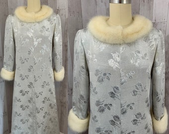 white fur dressing gown