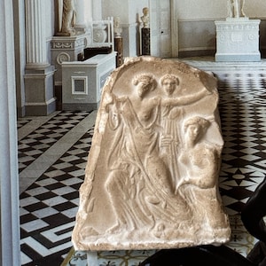 Dollhouse miniature reproduction of ancient Greek bas-relief