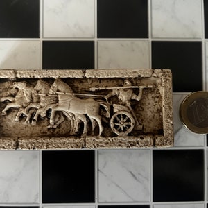 Miniature reproduction of ancient Greek bas-relief for dollhouse and diorama
