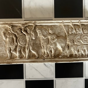 Miniature reproduction of ancient Greek bas-relief for dollhouse and diorama