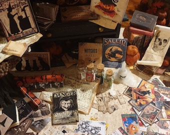May include: A collection of vintage Halloween-themed items, including books, scrolls, potion bottles, and a skull. The items are arranged on a table with a rustic wooden surface. The items are all in shades of brown, black, and white.