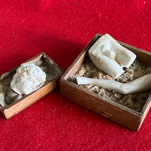 Dollhouse miniature archeological finds in  wooden boxes
