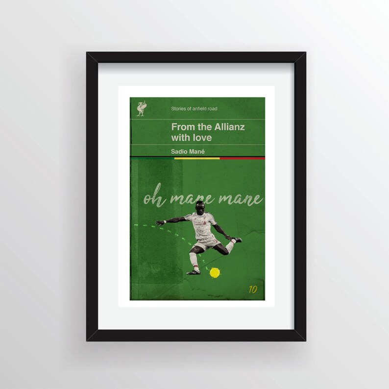 May include: A green and white poster with a soccer player kicking a ball. The poster has the text "Stories of Anfield Road" and "From the Allianz with love" and "Sadio Man&eacute;". The poster also has the text "oh mane mane" and the number "10".