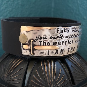 Fate whispers you can't withstand the storm -- The warrior whispers back I AM the STORM  with a SWORD ~ hand stamped leather cuff bracelet