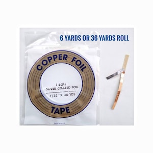 May include: A roll of 7/32 inch by 36 yard silver coated copper foil tape. The roll is labeled "Copper Foil Tape" and "1 Roll Silver Coated Foil 7/32" x 36 YDS". The label also says "Made in U.S.A.".