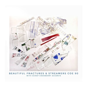 May include: A collection of broken glass pieces with colorful accents. The glass pieces are arranged in a circular pattern on a white background. The text "BEAUTIFUL FRACTURES & STREAMERS COE 90 WITH SCRAP CRANBERRY ACCENTS" is printed below the glass pieces.