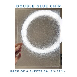 May include: A rectangular sheet of clear double glue chip glass featuring a textured, fern-like pattern on its surface. The text DOUBLE GLUE CHIP and PACK OF 4 SHEETS EA. 9" x 12"+- is printed in blue above and below the glass sheet.