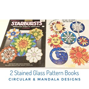 May include: Two stained glass pattern books with circular and mandala designs. One book is titled "STARBURSTS" and the other is "THE SUN, THE MOON AND THE STARS". The designs feature colorful suns, moons, stars, and floral patterns.