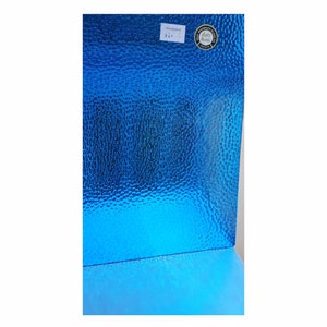 Medium Blue Stained Glass Sheets. Easy to Cut, Hammered Texture. Wissmach Cathedral, See Thru. Has a slight tint of Aqua Blue.