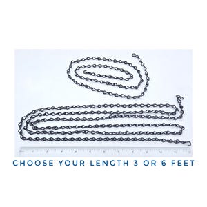 May include: Black metal chain with two different lengths, 3 feet and 6 feet. CHOOSE YOUR LENGTH 3 OR 6 FEET is written below the chains.
