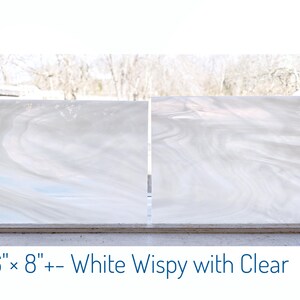 White Stained Glass Sheets. Light Wisps of Clear in White. Smooth Texture Easy to Cut. Nice for Mosaic Backgrounds. Oceanside fusible Coe 96