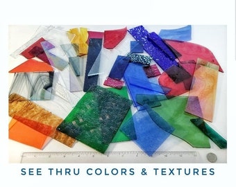 Scrap, Stained Glass Sheets, Pieces. See thru colors Blue Green, Orange, Purples with mix of speciality Textures. DIY mosaics, suncatchers.