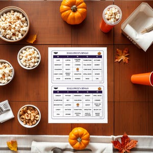 Halloween bingo page from the party games pack on a party table