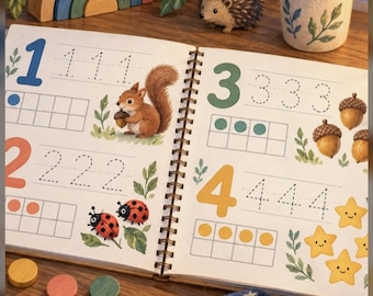 Könnte beinhalten: Ein spiralgebundenes Lernarbeitsheft mit dem Titel Numbers 1-20: Trace, Count & Play, das Seiten mit großen Zahlen, gepunkteten Linien zum Nachspuren, Zehnerfeld-Zählrastern sowie Illustrationen von Eichhörnchen, Marienkäfern, Eicheln und Sternen enthält.