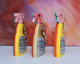 Double-Sided Reversible Opalite Nope-alite Bottle Keychain Bag Charm | Multiple Sizes & Finishes