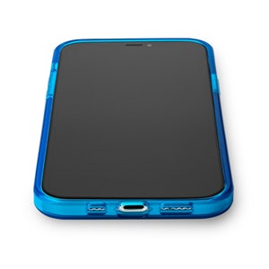 May include: A smartphone with a black screen is encased in a bright blue protective case. The case has a clear, transparent design, allowing the phone's features to be visible. The phone is positioned on a white surface.