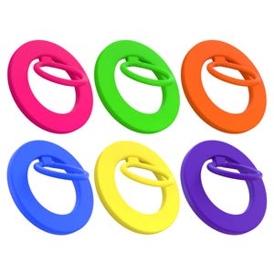 May include: Six colorful phone ring holders in a variety of bright colors: pink, green, orange, blue, yellow, and purple. Each ring holder has a circular base with a smaller, attached ring for finger grip. The holders are made of a smooth, solid material.