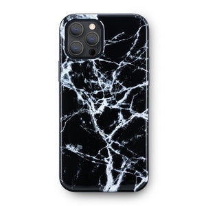 May include: Black phone case with a white marble pattern. The case has a raised camera bump with four lenses.