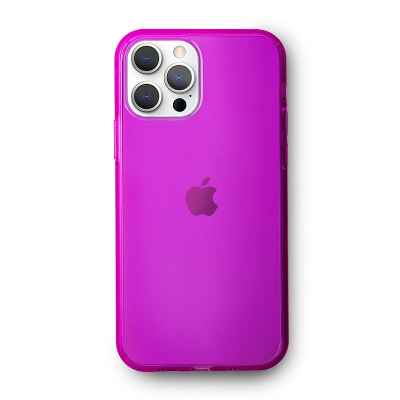 May include: A clear, bright pink phone case with a raised Apple logo. The case has a cutout for the camera lens and a clear back.