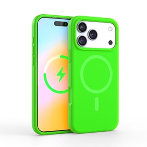 May include: Two neon green phone cases, one on a phone displaying a charging symbol. The cases have a smooth finish and a magnetic charging circle on the back. The phone screen shows a charging icon with a lightning bolt.