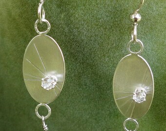 Single Starburst Oval Silver Earrings