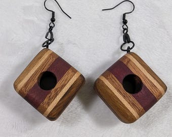 Orecchini in legno artigianali a forma di ciambella