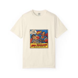 May include: A cream-colored short-sleeve t-shirt featuring a comic book graphic of a superhero hitting a person. The text reads: So yeah, I totally Vibe Coded... THWACK! Thanks to REAL PROGRAMMER the world remains safe.