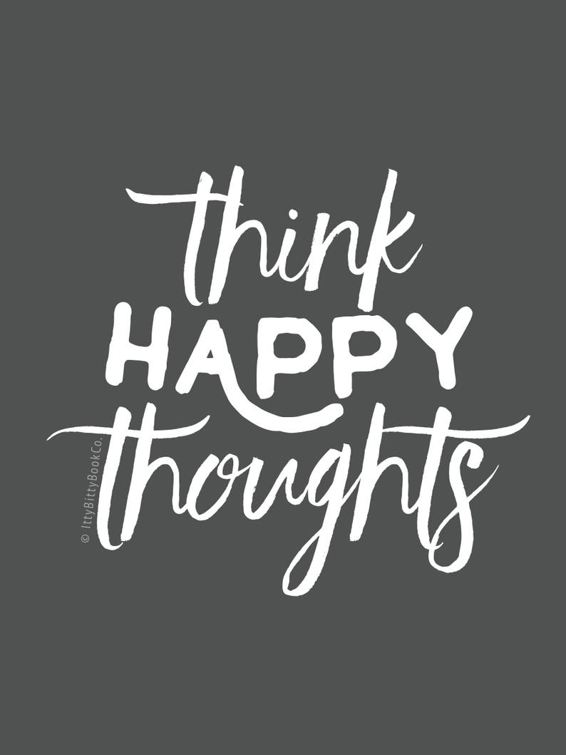 May include: White text on a dark gray background reads "think happy thoughts".