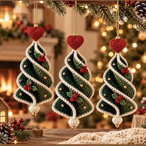 May include: Three spiral-shaped Christmas tree ornaments made of dark green and light green crochet yarn. Each ornament features a red crocheted heart at the top, white trim along the edges, small gold beads, and clusters of red berries.