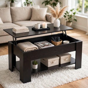 May include: A dark brown wooden lift-top coffee table with a rectangular surface that elevates to reveal an interior storage compartment. The table features a lower shelf holding two beige storage boxes and a small potted succulent plant.