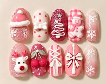 May include: A set of ten press-on nails featuring pink and red holiday designs. Decorations include a Santa hat, white bow, glittery Christmas tree, gingerbread man, snowflakes, a reindeer face, cherries, corset lacing, and a gift bow.