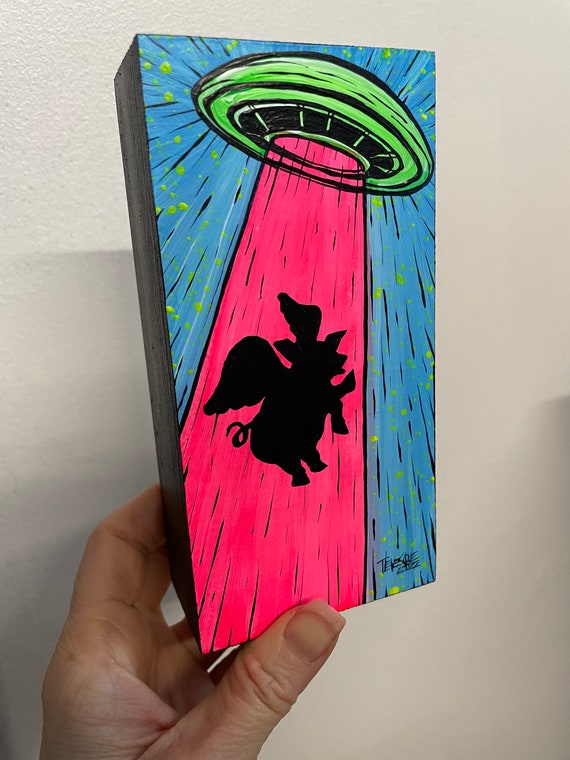 3x6” Neon Fluorescent Flying Pig UFO painting by Tracy Levesque