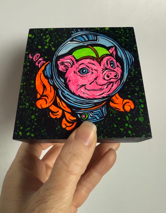 4x4” Amazing Space Pig Astronaut Whimsical Flying Pig UV Reactive Glows in Blacklight When Pigs Fly Fluorescent painting by Tracy Levesque