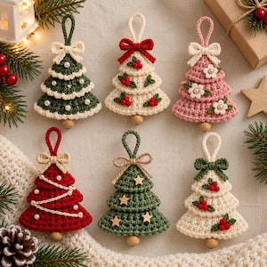 May include: Six crocheted Christmas tree ornaments with hanging loops. The trees feature various designs including white bows, red berries, small white flowers, wooden stars, and white pearl beads in green, cream, red, and pink yarn colors.