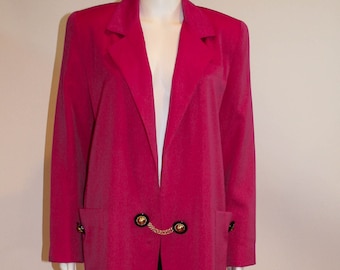 May include: A long, fuchsia pink blazer with a chain and gold buttons. The blazer has a long, open front and two pockets.