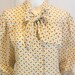 see more listings in the Vintage Blouses/Tops section