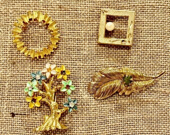 Broches vintage en tono dorado: Kramer, hoja, corona y árbol