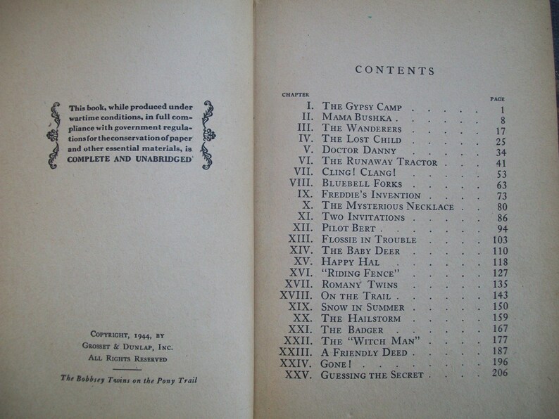May include: A book titled "The Bobbery Twins on the Pony Trail" with a table of contents listing 25 chapters. The book was published in 1944.