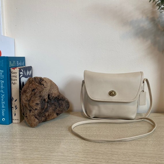 white leather coach purse