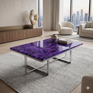 May include: A rectangular coffee table featuring a polished, deep purple agate stone top with natural crystalline patterns and a smooth, reflective surface, supported by a sturdy, silver-toned metal frame with a cross-base design.