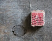 red U.S. postage stamp bundle