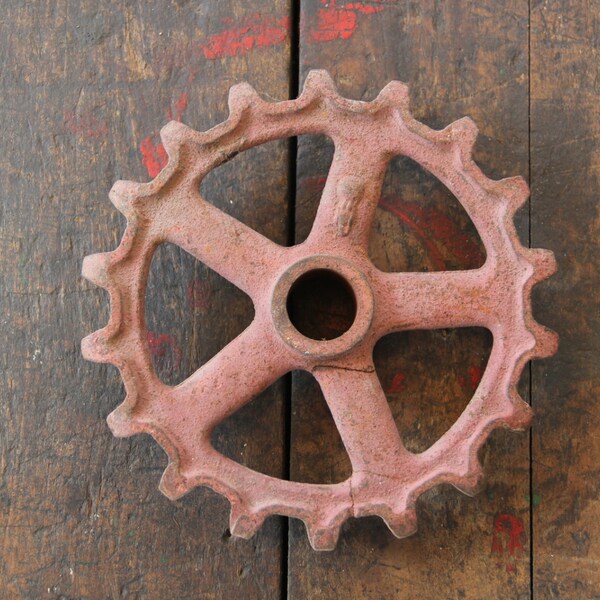 vintage machinery gear red cast metal