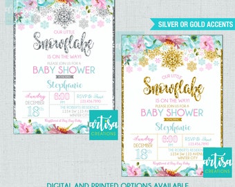 May include: A baby shower invitation with a snowflake theme. The invitation is decorated with silver glitter and snowflakes. The text on the invitation reads "Our Little Snowflake is on the way! Please join us for a Baby Shower Honoring Stephanie".