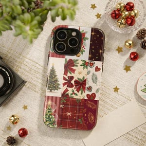 May include: A smartphone case featuring a festive patchwork design with various holiday-themed illustrations including Christmas trees, red bows, holly leaves, hearts, and a red plaid pattern. The case has a cutout for a triple-lens camera system.