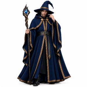 May include: A dark blue hooded cloak and matching pointed hat featuring gold trim, worn over a black tunic with a black leather belt. The outfit is paired with a tall, dark, twisted wooden staff topped with a glowing blue crystal.