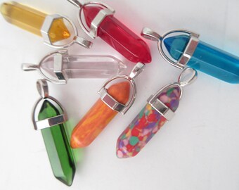 7 colgantes de cristal de doble punta con engastes de plata de 40 mm de largo.