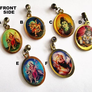 May include: Six oval-shaped pendants with different Hindu deities depicted on them. The pendants are gold-colored with a shiny finish. The deities are depicted in colorful detail. The pendants are labeled A through F.
