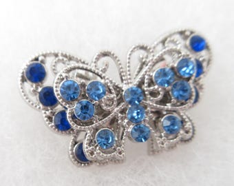 Broche vintage de mariposa con diamantes de imitación azules, broche de metal plateado de dos capas.