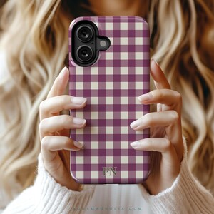 image of a iPhone case from a collection of 9 patterns to choose from; plaid, gingham tartan and checkered in warm colors olive, cream, plum, burgundy and harvest tones, personalized with a delicate name, monogram or initials. Available for the 17, 16, 15, 14, 13, 12 iPhone models. Clear, slim, tough and MagSafe case styles.
