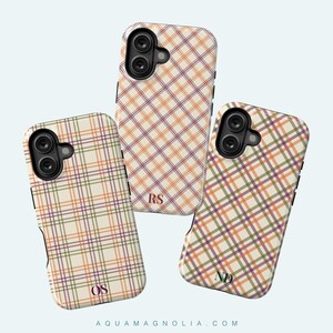 image of a 3 iPhone cases from a collection of 9 patterns to choose from; plaid, gingham tartan and checkered in warm colors olive, cream, plum, burgundy and harvest tones, personalized with a delicate name, monogram or initials. Available for the 17, 16, 15, 14, 13, 12 iPhone models. Clear, slim, tough and MagSafe case styles.